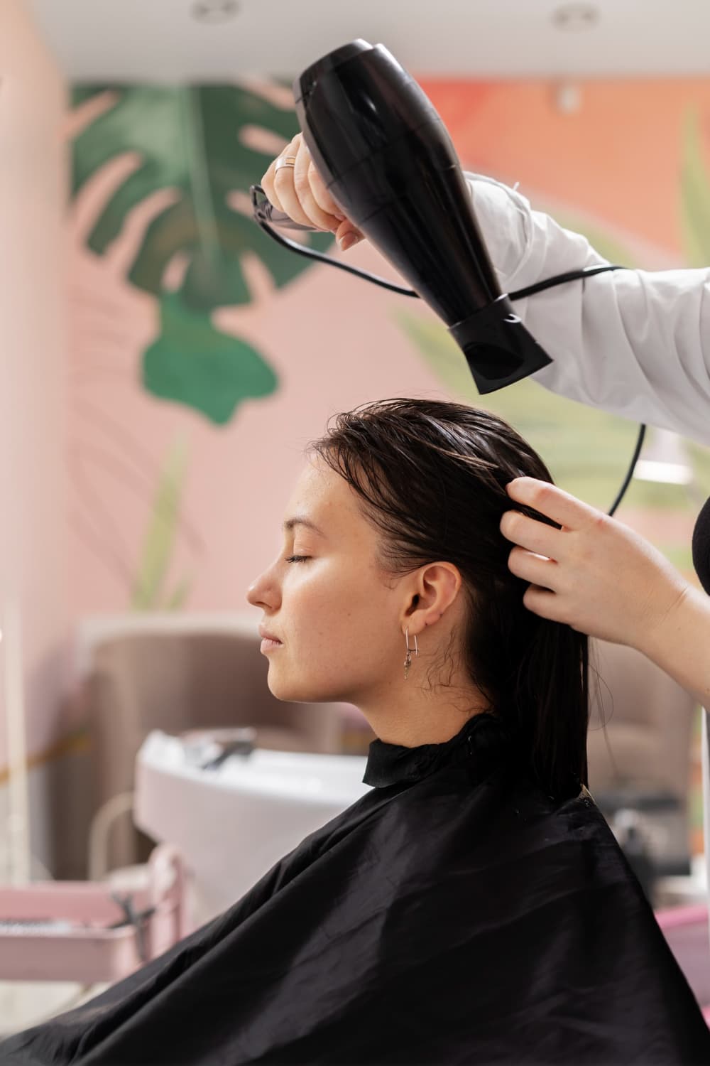 Lady getting a blowdry at the salon